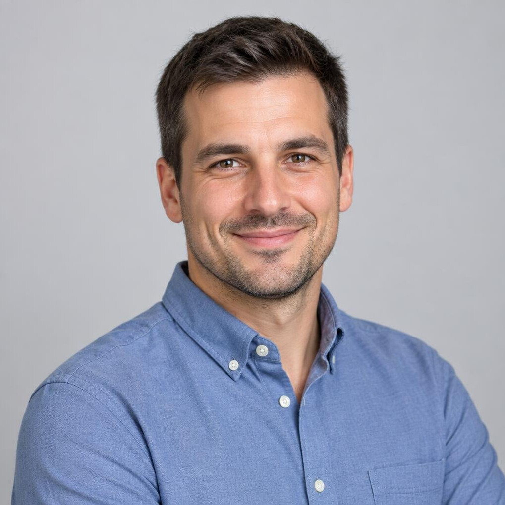 Portrait of a smiling male programming instructor